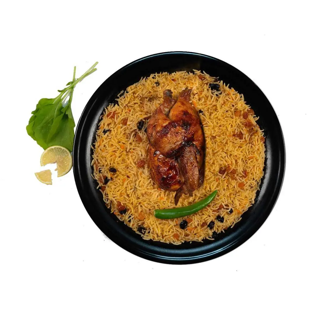 Half chicken cooked on wood with rice