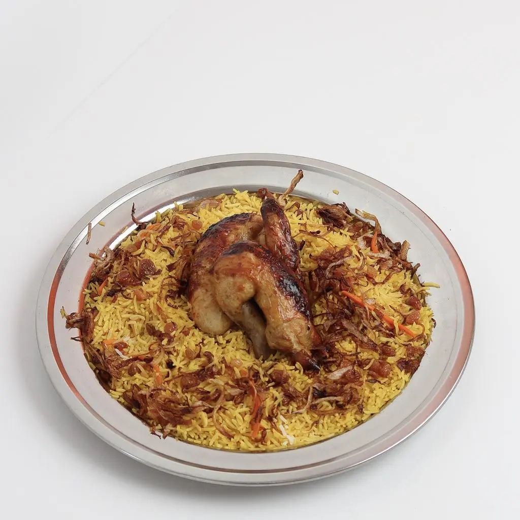 دجاج شواية مع رز بخاري