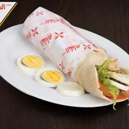 Falafel sandwich with eggs