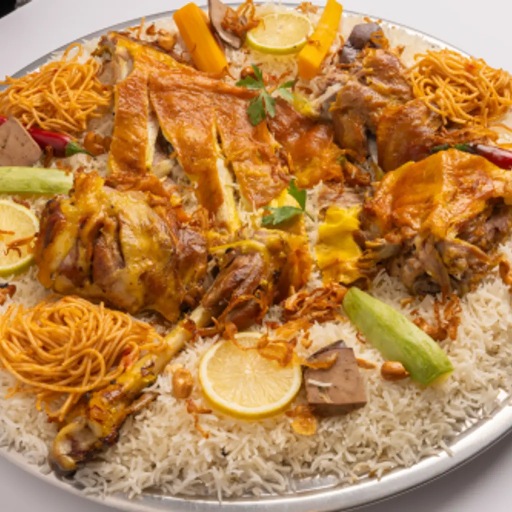 ربع تيس لحم مندي مع الارز