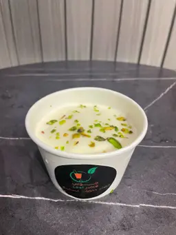 Cream ice cream with nuts