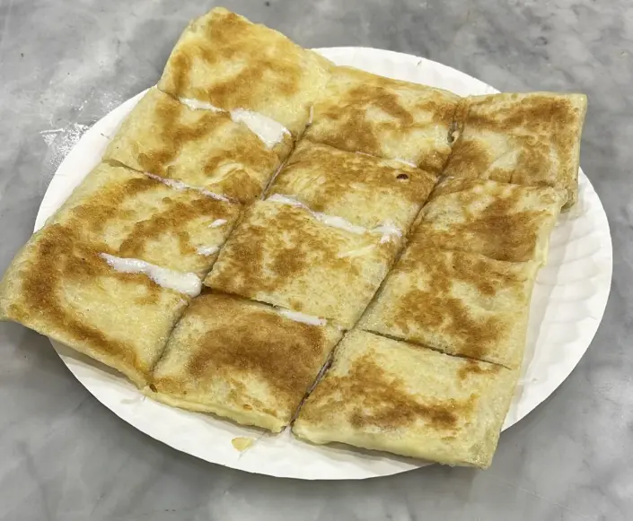 مطبق بالجبنة